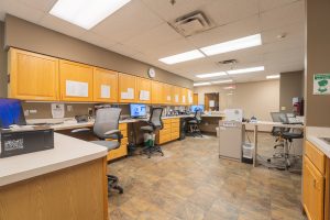 Wedgewood Urgent Care interior showing desks and computers