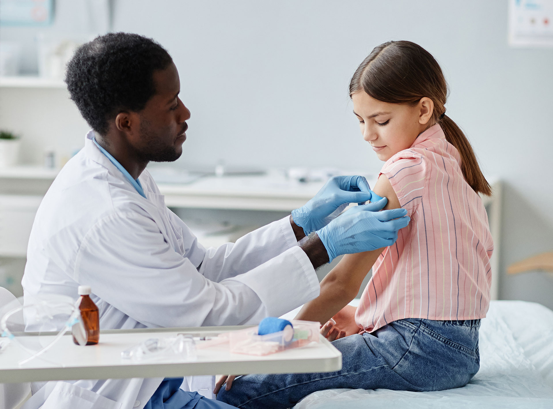Doctor with Pediatric Patient